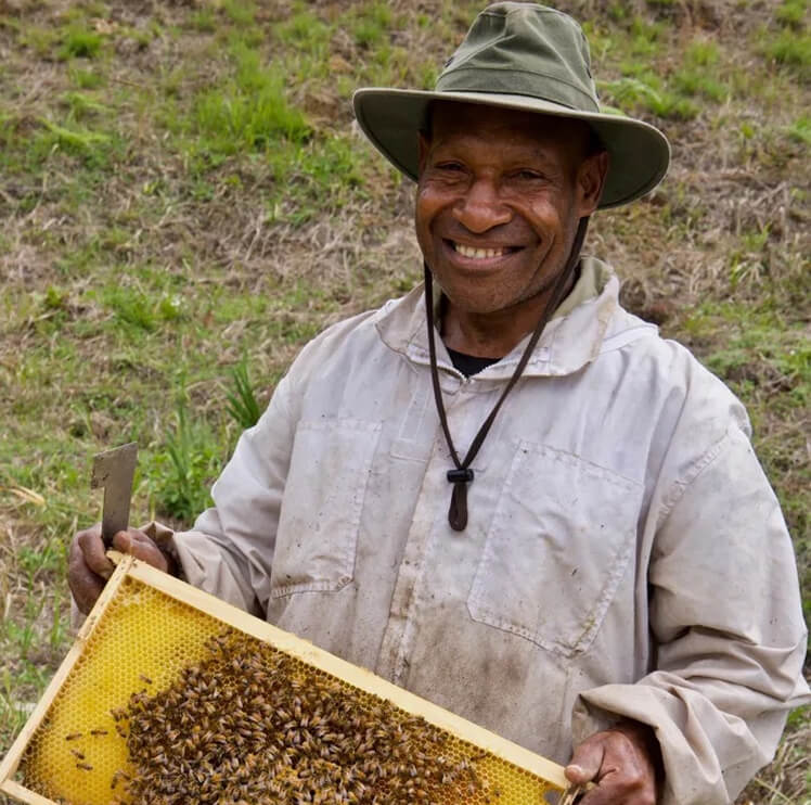 Farmer-Gallery_Image4 Man with beehive
